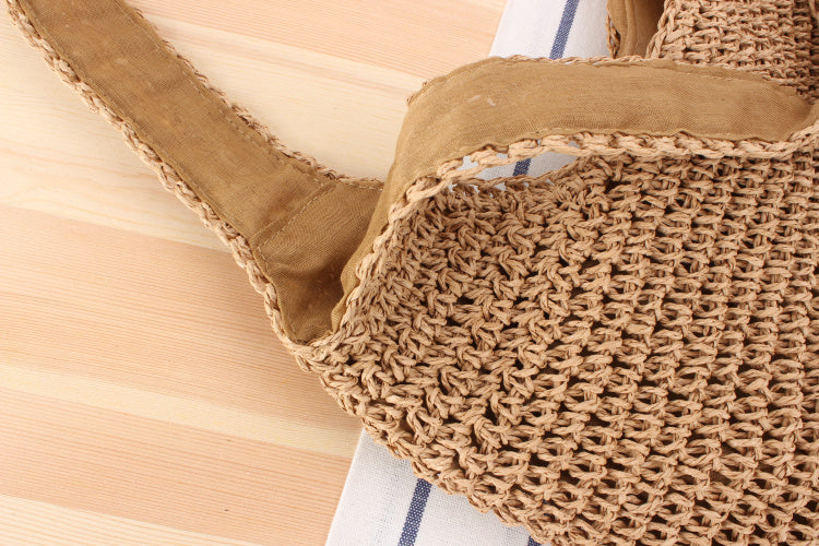 Shoulder bag made of braided straw