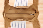 Shoulder bag made of braided straw
