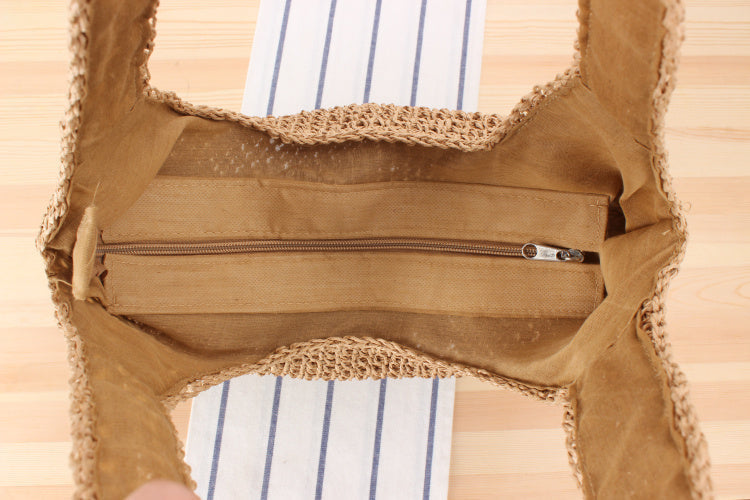 Shoulder bag made of braided straw
