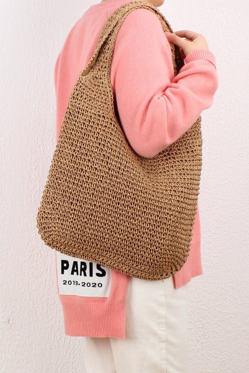 Shoulder bag made of braided straw