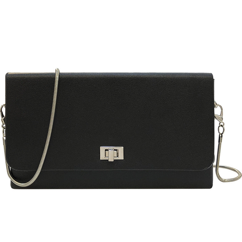 Women's clutch bag with elegant flap closure and innovative design