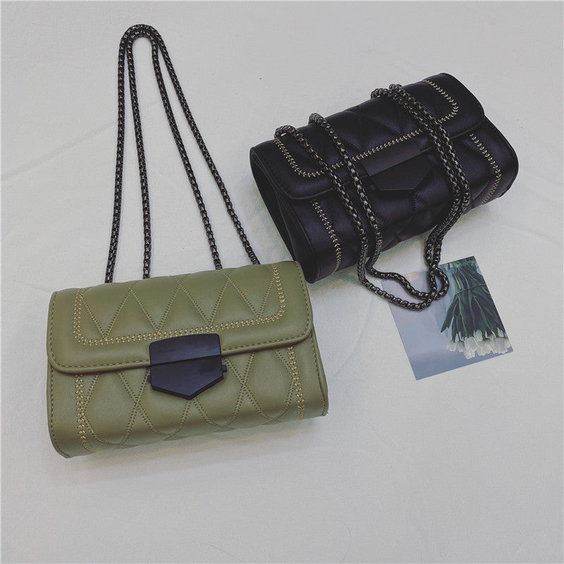 Women's clutch with stylish quilted design and detachable chain strap