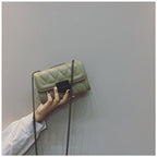 Women's clutch with stylish quilted design and detachable chain strap
