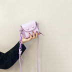 Women’s mini handbag with playful chain pull