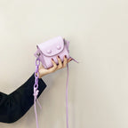 Women’s mini handbag with playful chain pull