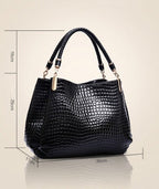 Shoulder bag with crocodile pattern