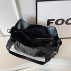 Casual shoulder bag with zippers and adjustable strap