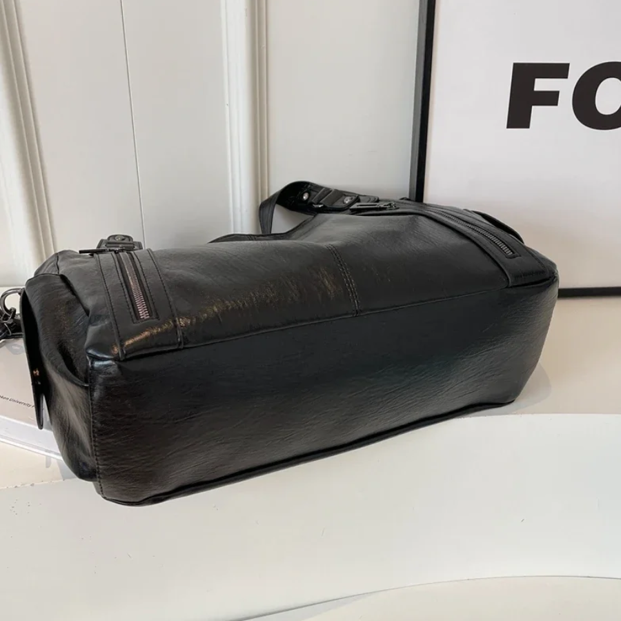 Casual shoulder bag with zippers and adjustable strap