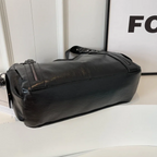 Casual shoulder bag with zippers and adjustable strap