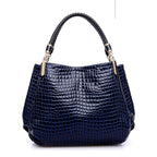 Shoulder bag with crocodile pattern