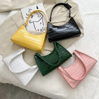 Women's leather shoulder bag in retro style