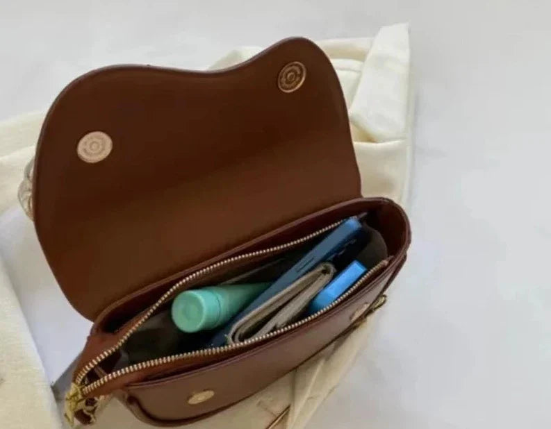 Women's shoulder bag made of PU leather with wide strap