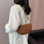 Women's shoulder bag made of PU leather with wide strap
