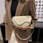 Women's shoulder bag made of PU leather with wide strap