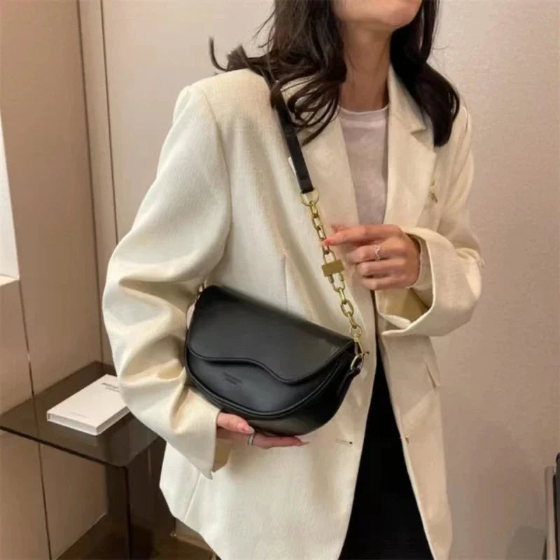 Women's shoulder bag made of PU leather with wide strap