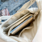 Shoulder bag with artistic fan design