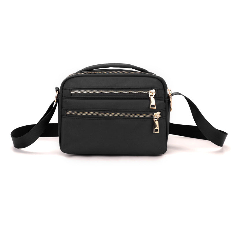 Multi-Zippered Crossbody Organizer Bag