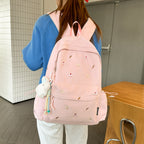 Playful backpack with unique back pattern appliqués