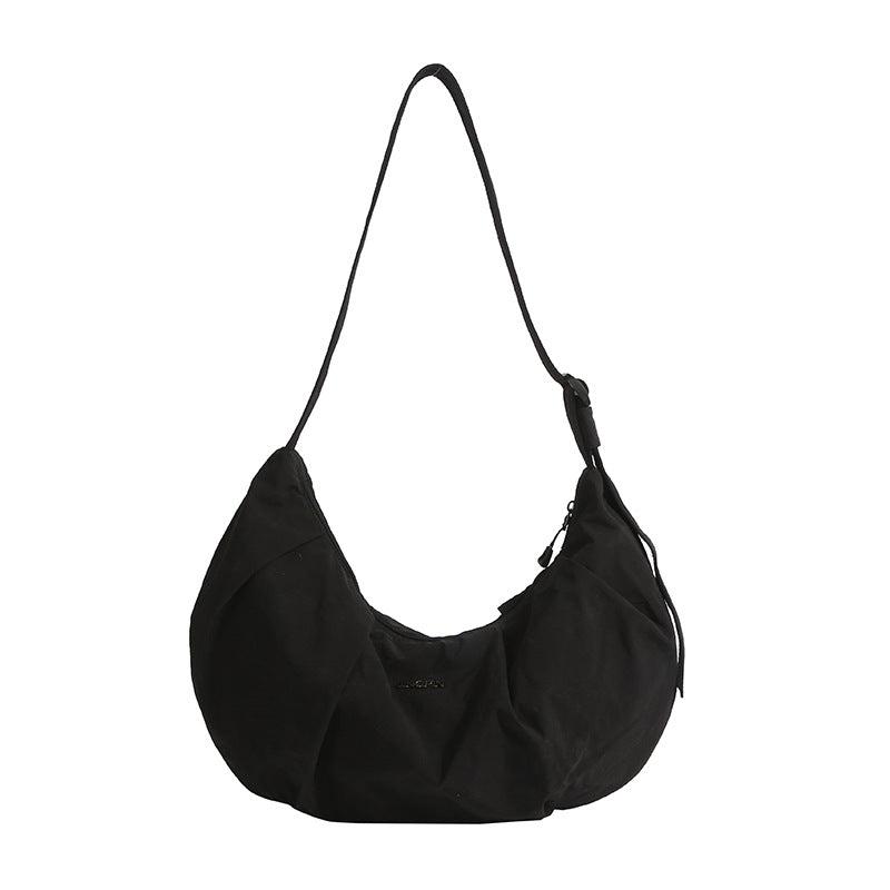 Fashionable shoulder bag with adjustable shoulder strap and practical design