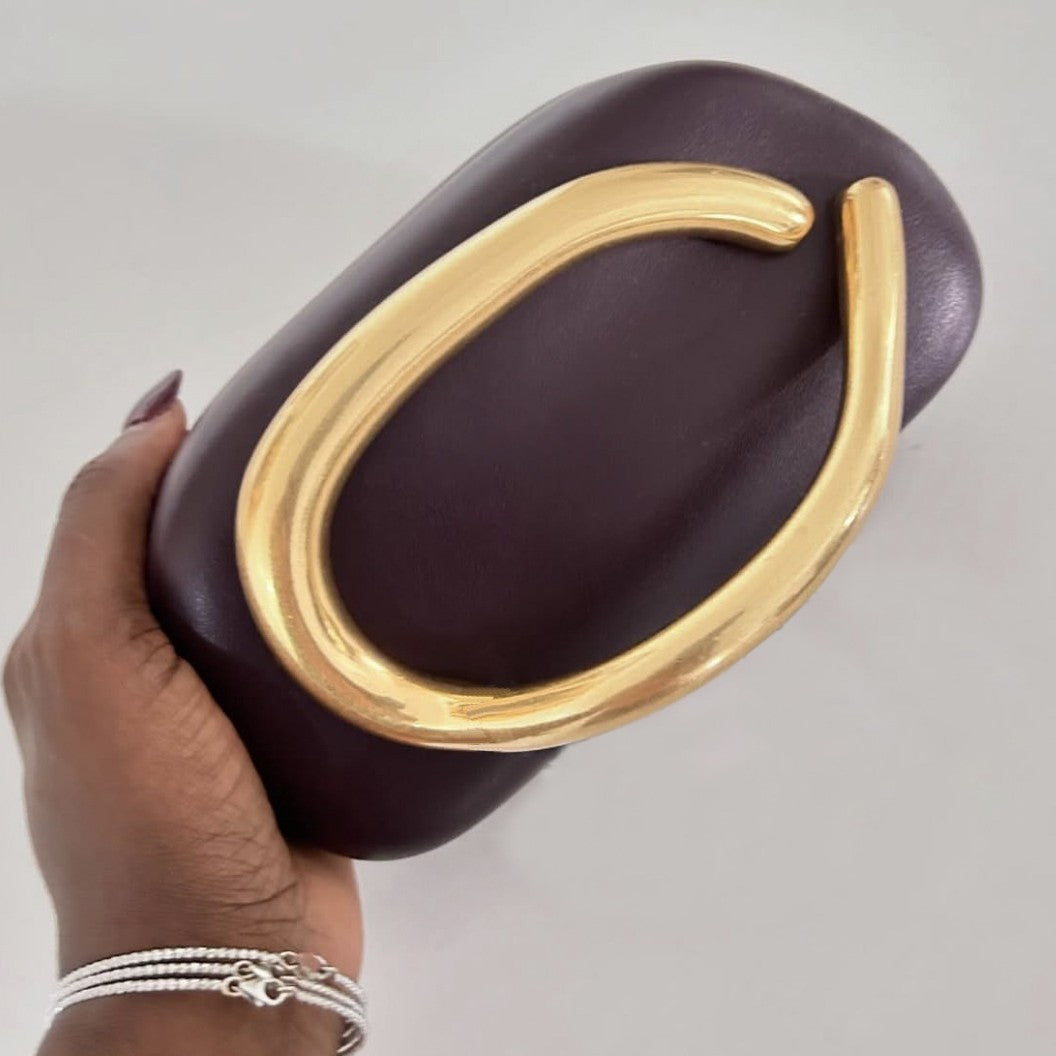 Statement Clutch with Sculptural Handle