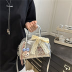 Ladies Mini Handbag with playful animal motif and charming charm