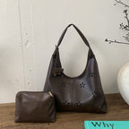 Women's hobo bag with floral design and practical mini organizer