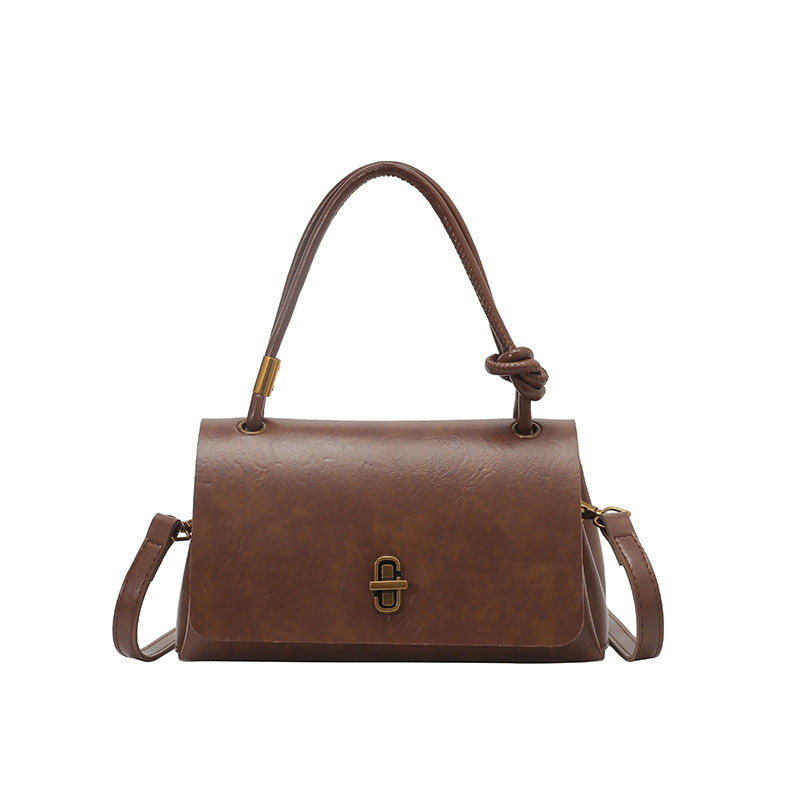 Women's elegant handbag with detachable shoulder strap