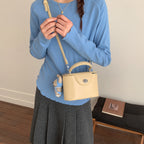 Women’s mini handbag with cute animal pendant