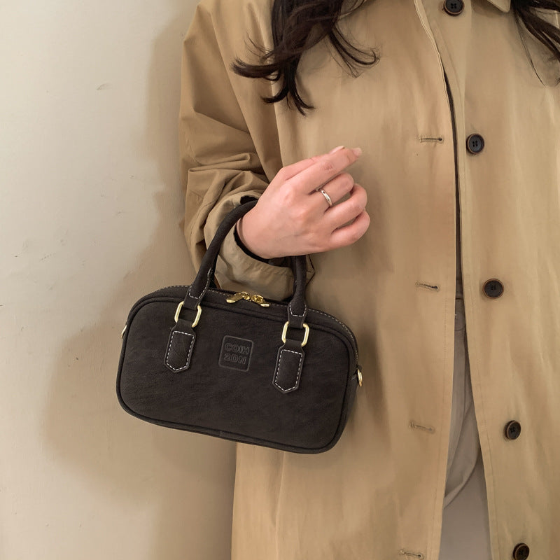 Women's mini handbag with practical shoulder strap
