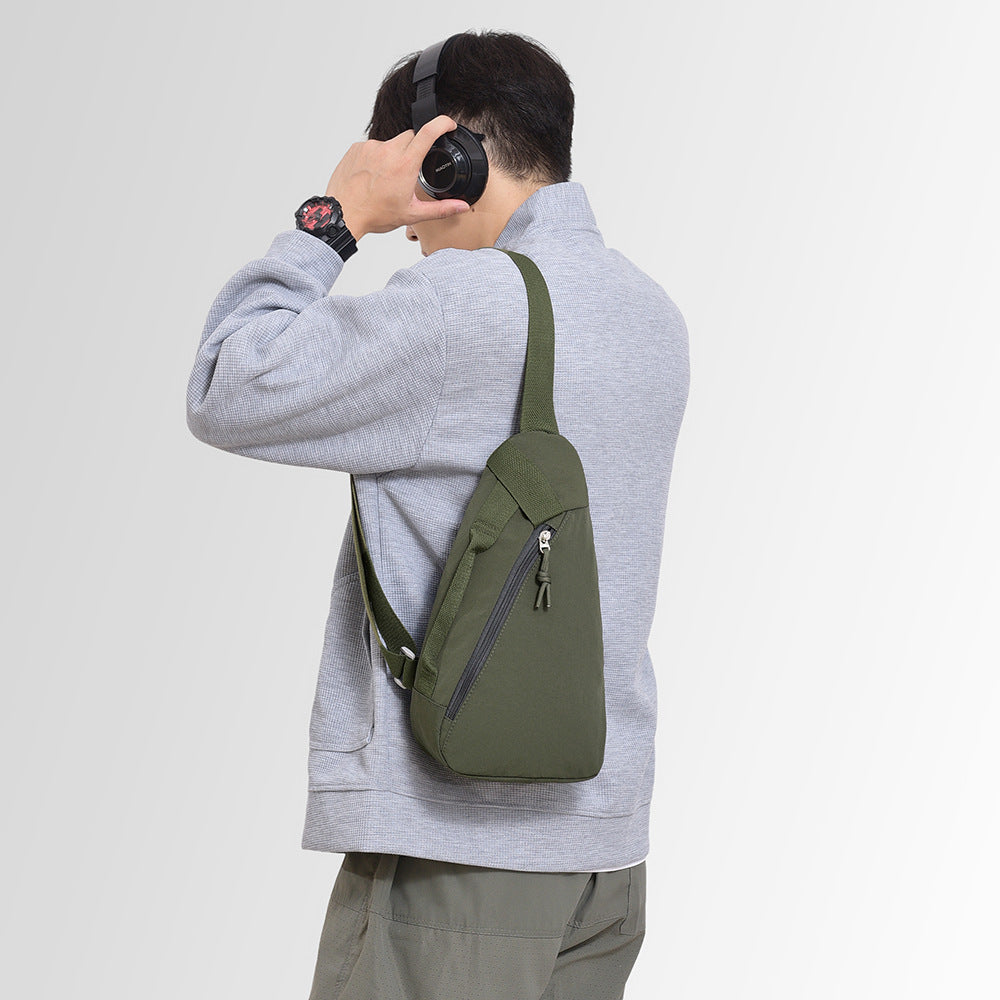 Sling bag with ergonomic design and additional compartments