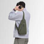 Sling bag with ergonomic design and additional compartments