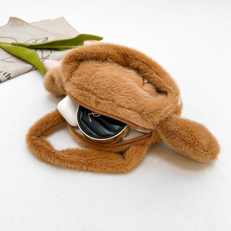 Playful plush handbag with ears and character design