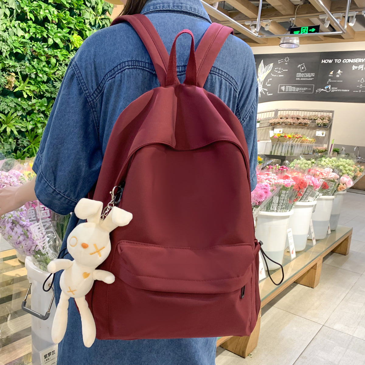 Multi-functional backpack with integrated keychain