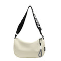 Fashionable shoulder bag with adjustable carrying strap