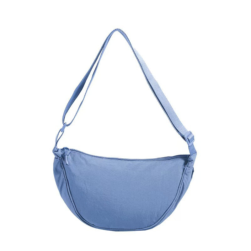 Shoulder bag with adjustable shoulder strap and practical compartments