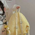 Plush backpack with cheerful design