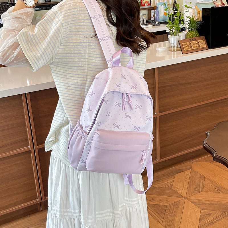 Cute everyday backpack with embroidered bows