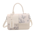 Ladies elegant mini handbag with floral design