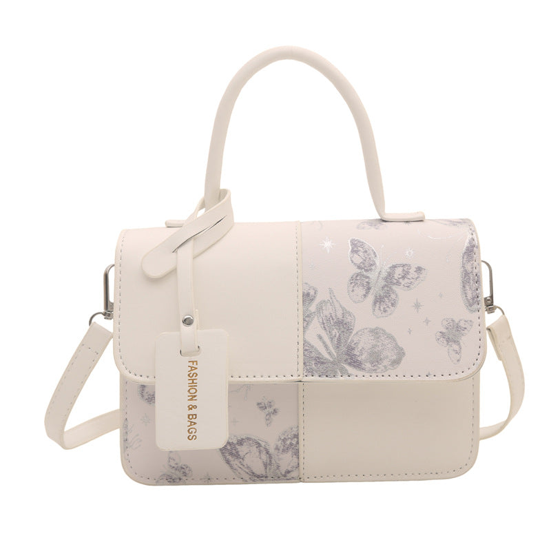 Ladies elegant mini handbag with floral design