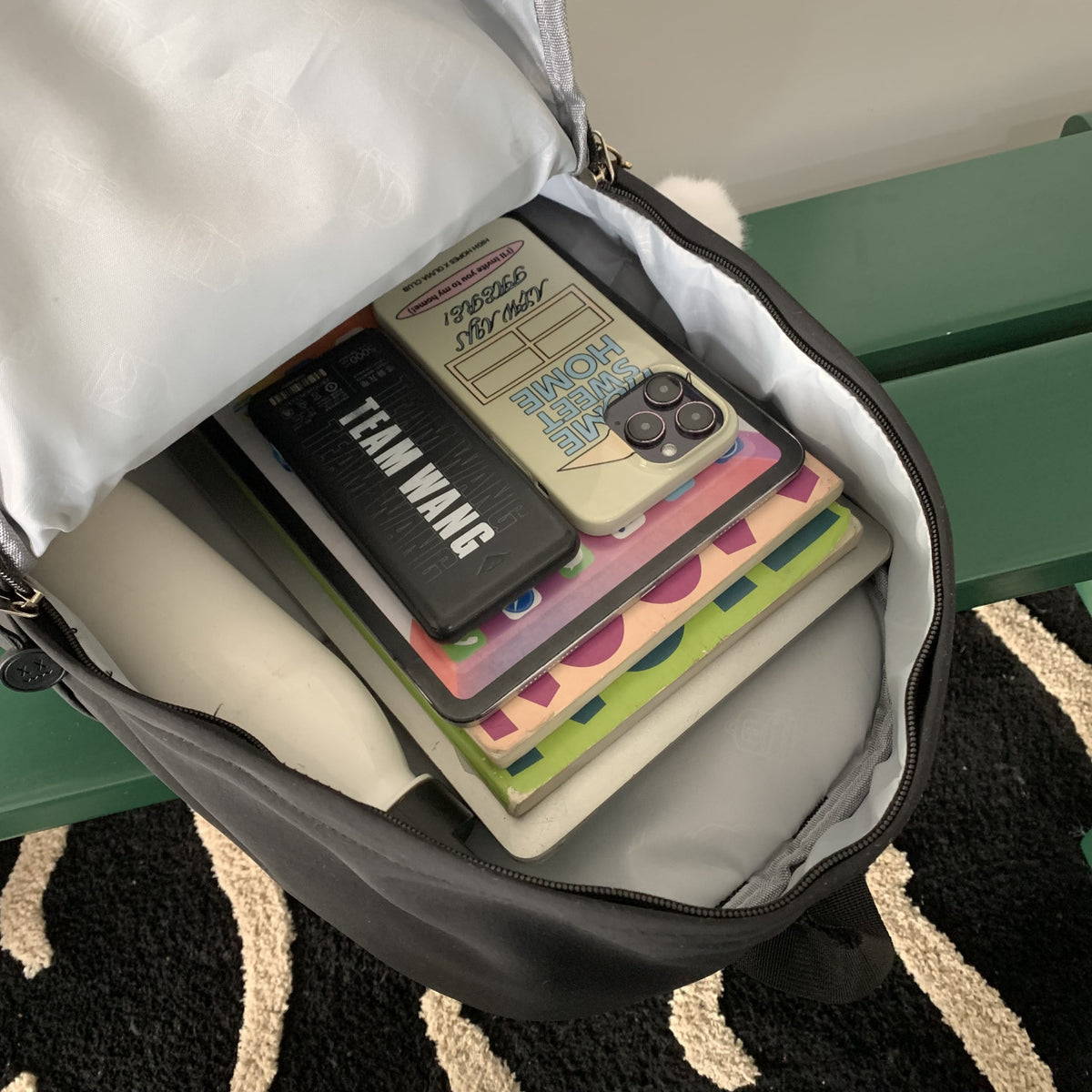 Practical backpack with colorful applications