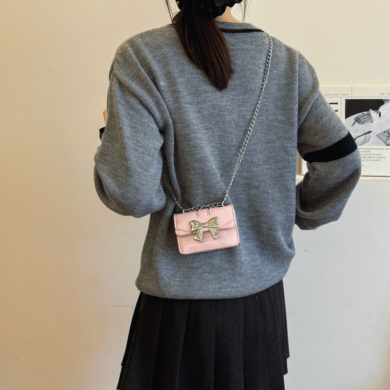 Ladies Mini Handbag with Shimmering Bow Closure