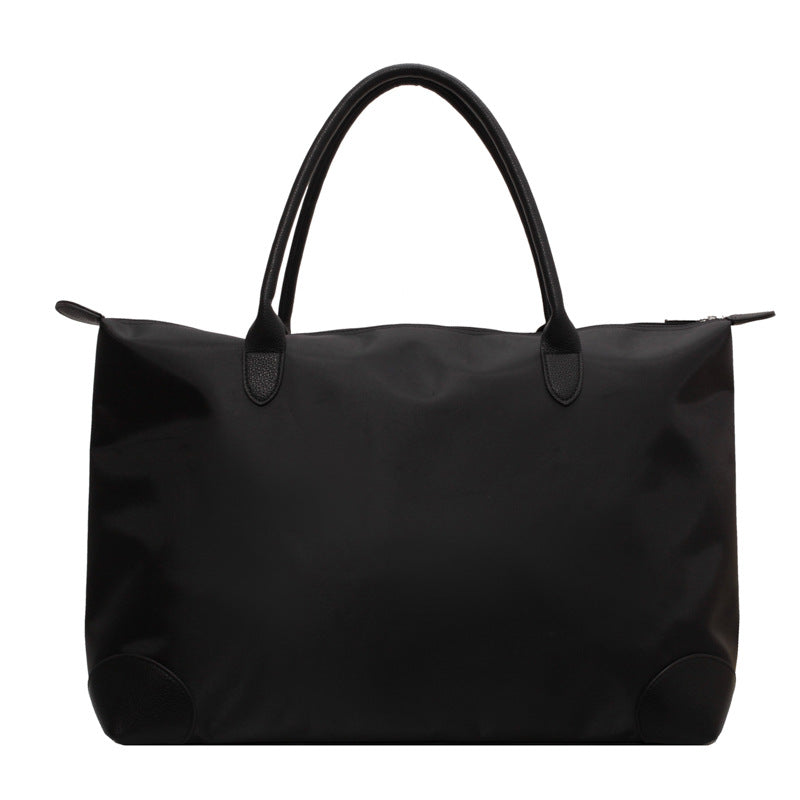 Large travel bag with durable material and multiple compartments