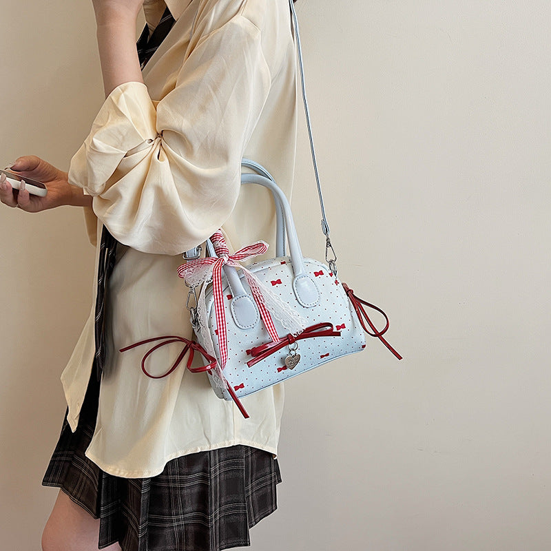 Women’s mini bag with playful design and charming details