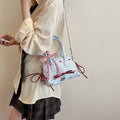 Women’s mini bag with playful design and charming details