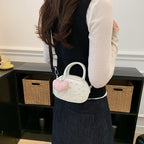 Ladies trendy mini handbag with striking pearl applications