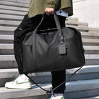 Travel bag with waterproof material and practical carrying options