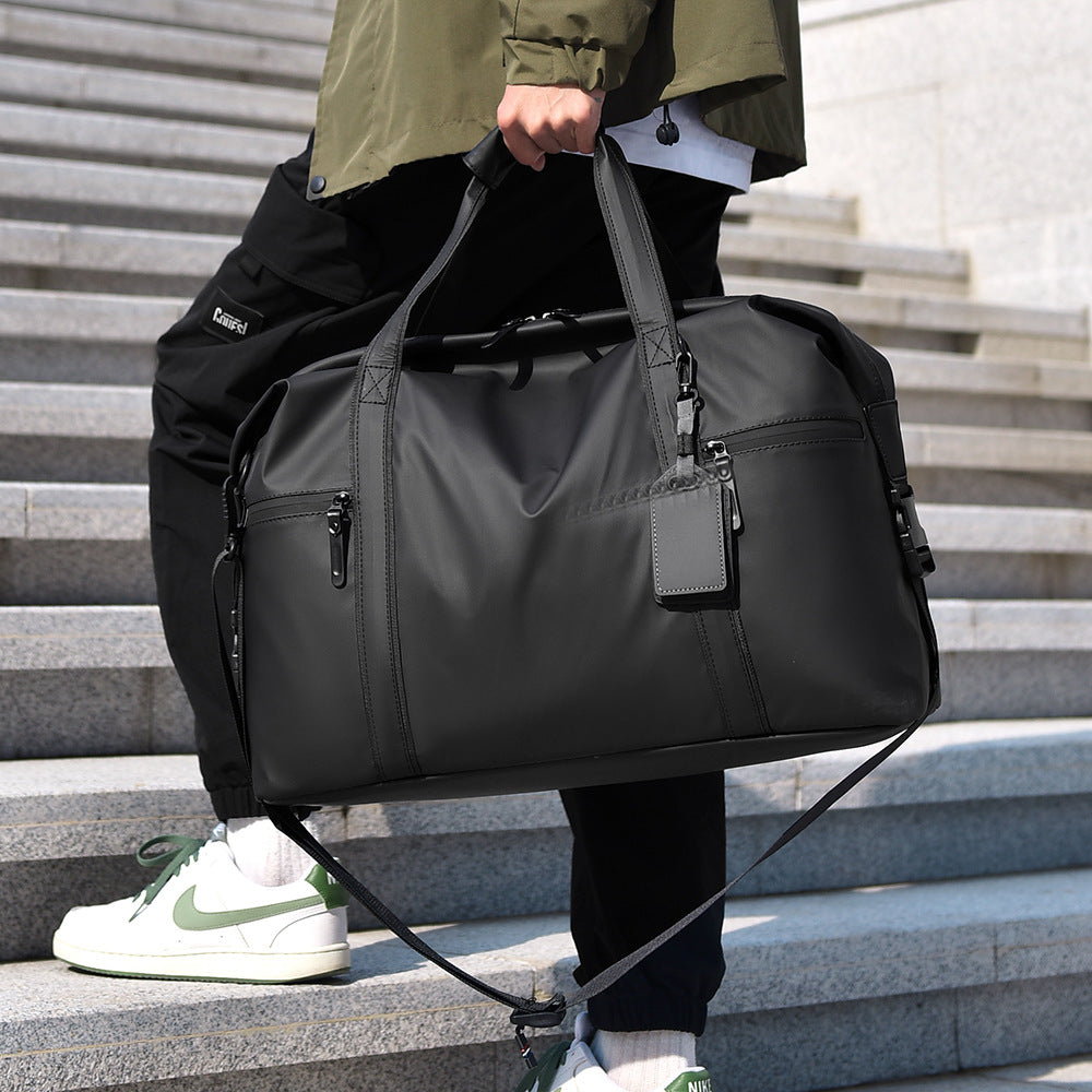 Travel bag with waterproof material and practical carrying options