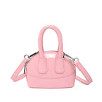 Ladies mini handbag with elegant glossy finish and removable shoulder strap