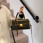 Women's elegant handbag with golden accents
