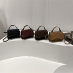Women's mini handbag with removable carry handle